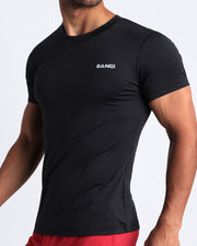 Side view of men’s exercise tee in a black color made by BANG! Clothing the official brand of mens beachwear. 