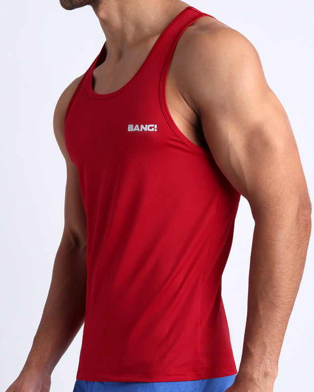 Side view of gym tank top for men in bright red color made by BANG! Clothing the official brand of mens beachwear. 