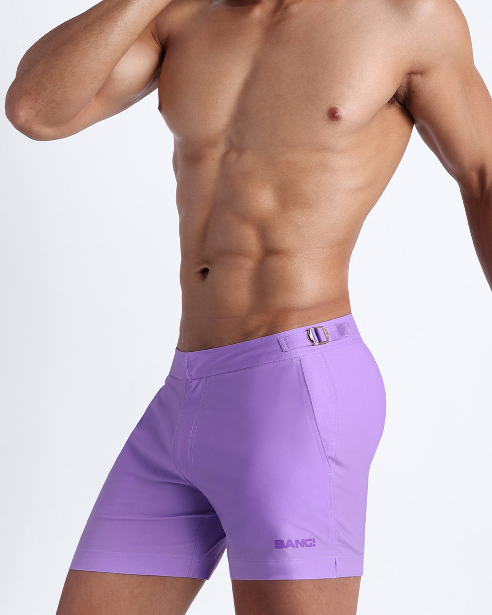 Left side view of men’s swimsuit in a lilac color made by Miami based Bang brand of men's beachwear