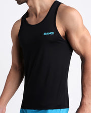 Side view of men’s fitness tank top in black color made by BANG! Clothing the official brand of mens beachwear. 