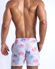 Back view of the OH L'AMOUR men’s beach swimsuit by BANG! inspired by 80s techno band erasure and Toile de Jouy scenes.