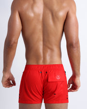Back view of the PRIME RED beach trunks for men by BANG! menswear Miami in bright red color as in Baywatch Swimsuit.