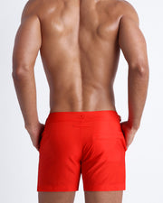 Back view of the PRIME RED beach trunks for men by BANG! menswear Miami in bright red color