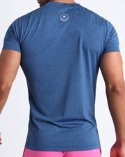 Back view of the STEEL BLUE men's fitness shirt in a dark blue color by BANG! menswear Miami.