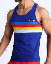Side view of men's blue casual tank top with color stripes, made by the Miami-based Bang! Clothes with official logo of Bang! Brand. 