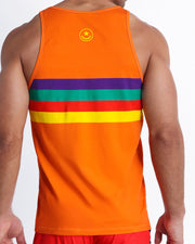 Back view of male model wearing a cotton tank top for men in orange color with color stripes in yellow, red, teal, dark purple perfect for poolside & beach.