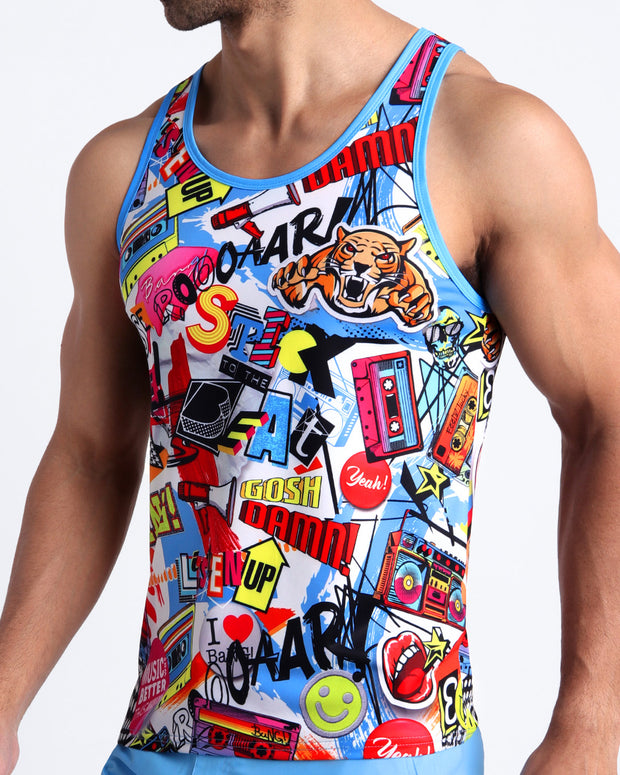 Side view of a sexy male model wearing a Summer casual tank top for men in a vibrant fun pop-culture theme made by the Bang! Brand of men&