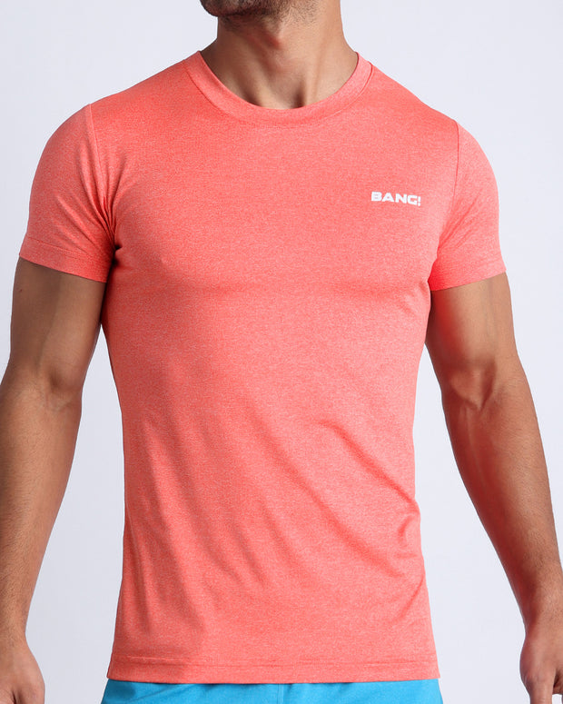 Frontal view of male model wearing the VITAL RED in a solid light red quick-dry workout shirt by the Bang! brand of men&
