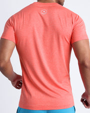 Back view of the VITAL RED men's fitness shirt in a coral color by BANG! menswear Miami.