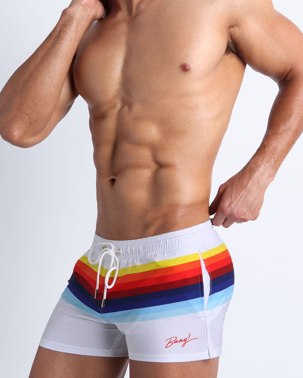 Side view of the STRIPES ON 45  swim trunks for men in solid white and vintage 80s stripes Bang! Clothing of Miami.