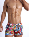 Super Pop men's beach shorts feature fun and enegetic comics-style graphics in bold colors, with a prominent BANG! illustration.