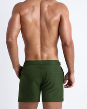 Back view of the ALPHA GREEN beach trunks for men by BANG! menswear Miami in military green color.