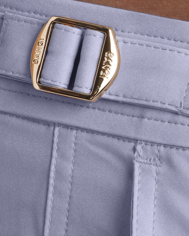 Close-up view of the GREY ANATOMY men’s swimwear, showing custom branded golden adjustable side buckles.