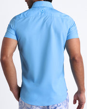 Back view of the MAGNET BLUE hawaiian shirt for men by BANG! menswear Miami in azure blue color.