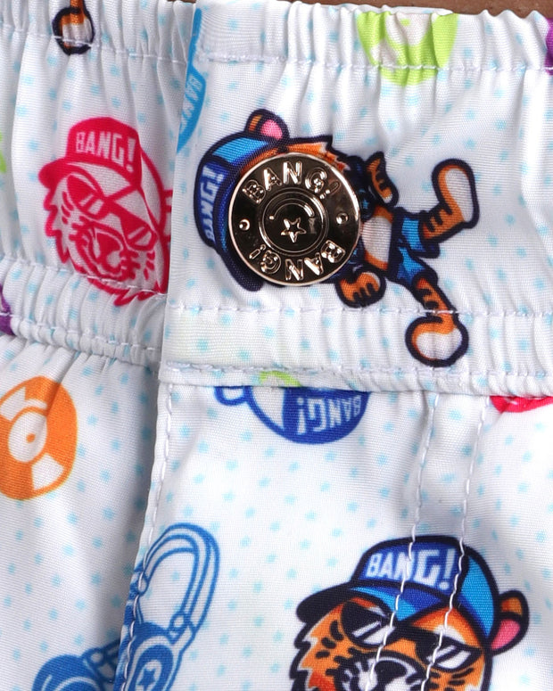 Close-up view of the HEY MISTER TJ (Poolside MIX) men’s swimwear, showing custom branded metal button  in gold by Bang!