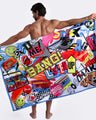 Model showing the STRIPES ON 45 quick-dry microfiber towel with matching swim briefs with pop-culture theme made by the Bang! brand of men's beachwear.