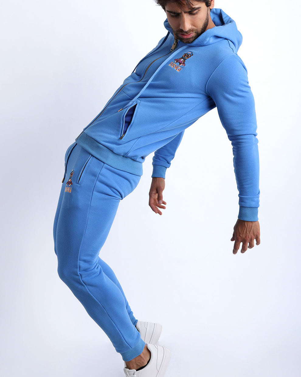 Sexy male model wearing the perfect CITY BLUE a denim blue color men's zippered hoodie to keep you warm during chilly fall weather. With it's soft, warm fabric and it's two front zipper pockets and hood with adjustable drawcord. 