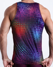Back view of male model wearing the CONFESSIONS ON A SAND FLOOR summer tank top for men by BANG! Miami in a pop color disco ball print in purple, blue, red and yellow.