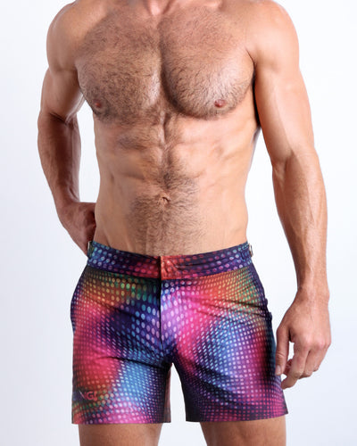 Front view of model wearing the CONFESSIONS ON A SAND FLOOR men’s beach tailored shorts in multiple colors Disco Ball design by the Bang! Clothes brand of men's beachwear from Miami.