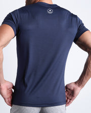 Back view of the CORE BLUE men's fitness shirt in a dark navy blue color by BANG! menswear Miami.