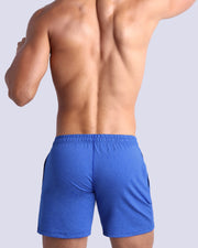 Back view of the ELECTRIC BLUE men's fitness sweatshorts in a royal blue color by BANG! menswear Miami.