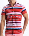 Front view of the FAWCETT SARAPE men’s short-sleeve  hawaiian stretch shirt featuring the iconic Farrah Fawcett 1976 swimsuit poster designed by the Bang! brand of men's beachwear from Miami.