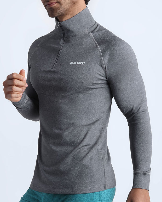 Side view of men’s performance exercise top in a stone grey color made by BANG! Clothing the official brand of mens sportswear. 