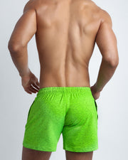 Back view of the GREENDURANCE men's fitness sweatshorts in a lime green color by BANG! menswear Miami.
