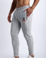 Side view of the GREY men's sweatpants with zipper pockets by BANG! Clothes based in Miami. This jogger is soft and skin-friendly with two pockets to store small things like phone and keys.