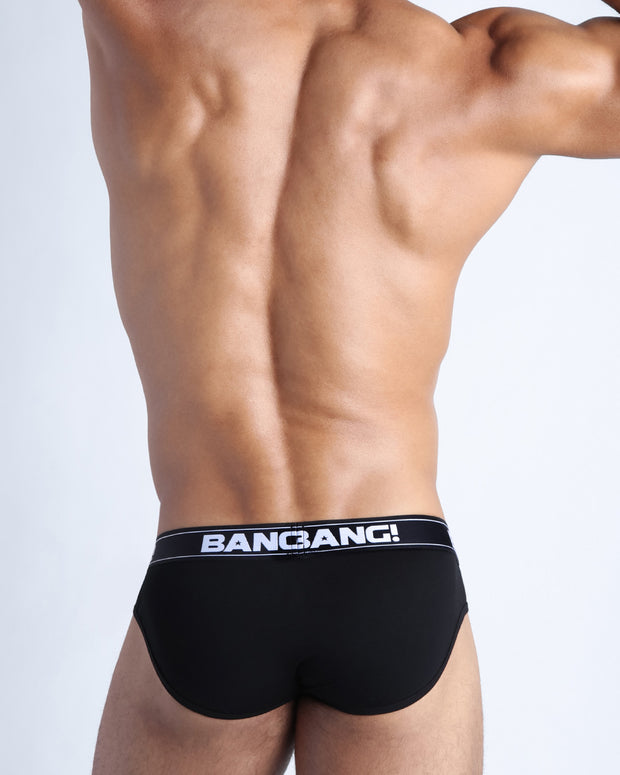 Back view of model wearing the MAX BLACK Men’s beathable cotton briefs for men by BANG! Offers light compression for perfect contouring to the body and second-skin fit.
