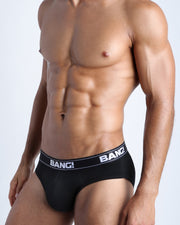 Side view of model wearing the MAX BLACK soft cotton underwear for men by BANG! Clothing the official brand of men's underwear.