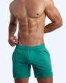 Side view of men’s performance exercise shorts in a green color made by BANG! Clothing the official brand of mens sportswear.
