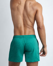 Back view of the MOBILITEAL men's fitness sweatshorts in a light teal color by BANG! menswear Miami.