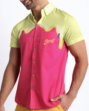 Side view of the MY MILKSHAKE men’s Summer button down featuring magenta pink color with pastel yellow melting ice cream print with pocket by Miami based Bang brand of men's beachwear.