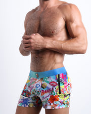 Side view of men’s Summer swimsuit in PEOPLE FROM IBIZA in a pop color with the miami pop art made by Miami based Bang brand of men's beachwear.