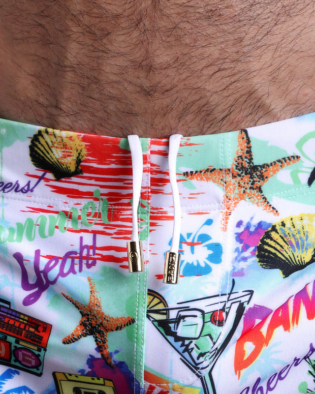 Close-up view of the PEOPLE FROM IBIZA men’s drawstring briefs showing white cord with custom branded golden cord ends, and matching custom eyelet trims in gold.