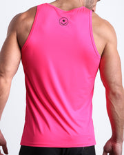 Back view of the PINK BOMB men's fitness tank top in a bright pink color by BANG! menswear Miami.