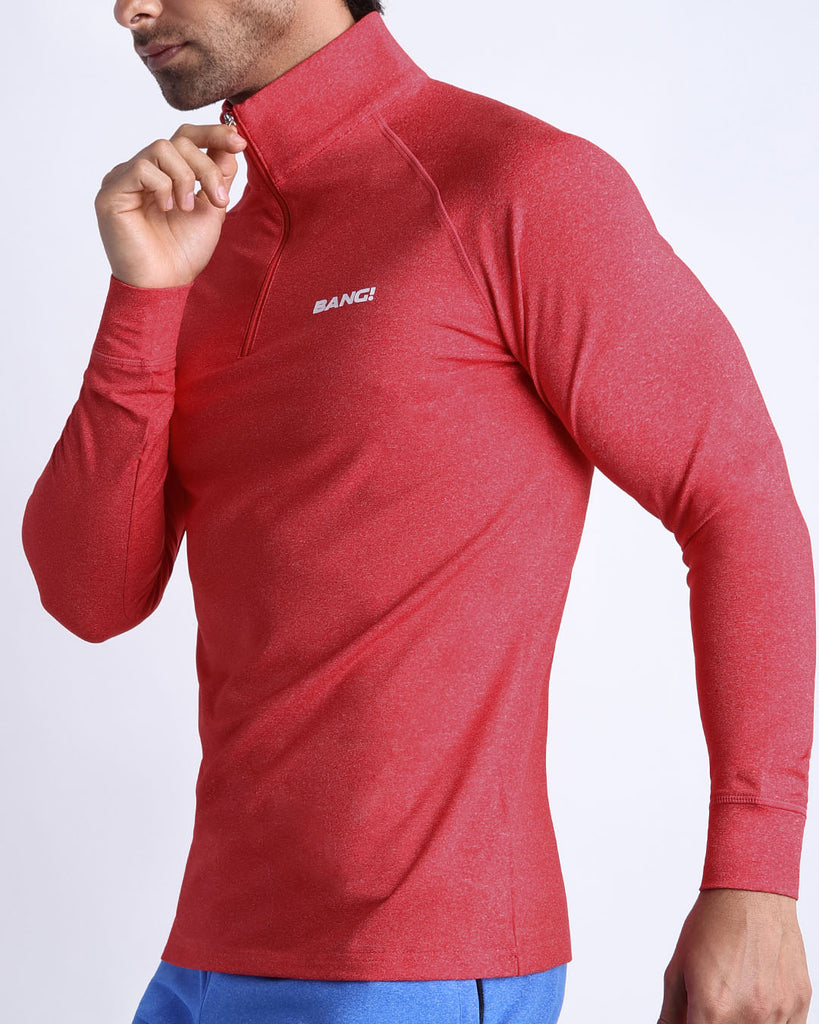 Frontal view of male model wearing the READY RED in a solid red quick-dry long-sleeve shirt by the Bang! brand of men's beachwear from Miami.