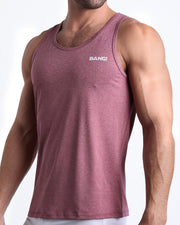 Side view of men’s workout tank top in solid red color made by BANG! Clothing the official brand of mens beachwear. 