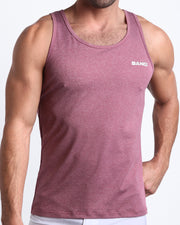 Frontal view of male model wearing the RIPPED CRIMSON in a heathered red gym tank top for men by the Bang! brand of men's beachwear from Miami.