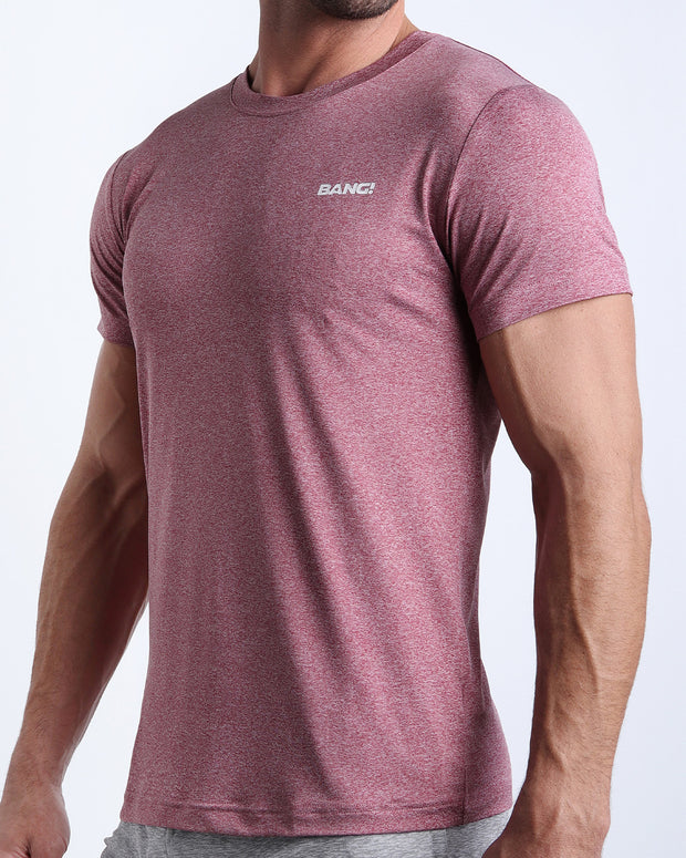 Side view of men’s exercise tee in a red color made by BANG! Clothing the official brand of mens beachwear. 