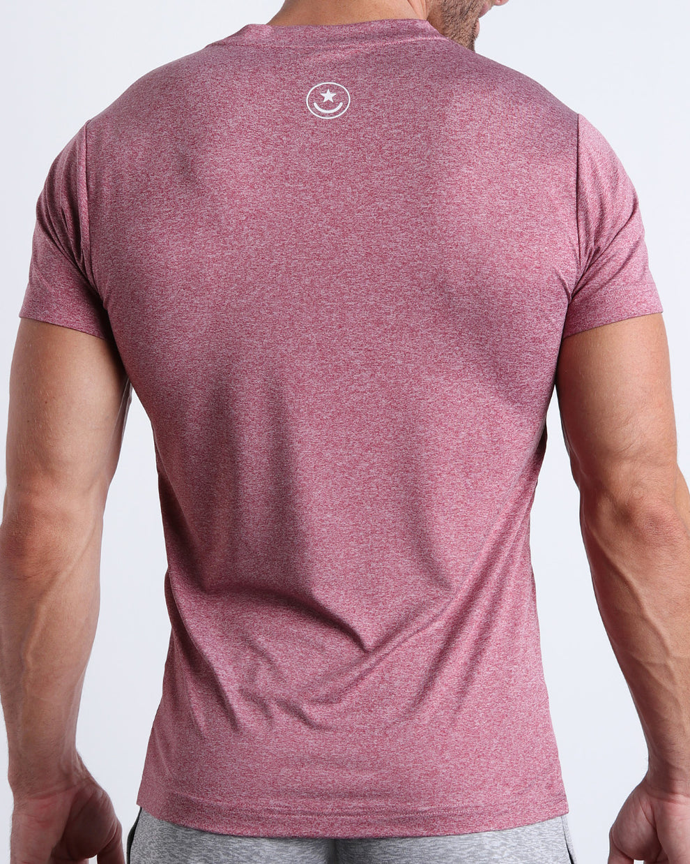Back view of the RIPPED CRIMSON men's fitness shirt in a red color by BANG! menswear Miami.