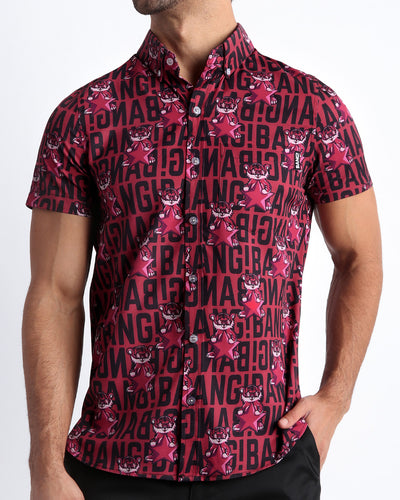 Front view of the STARSTRUCK men’s short-sleeve Hawaiian stretch shirt in a red berry color with black BANG! Typography print and tiger pop art by the Bang! brand of men's beachwear from Miami.