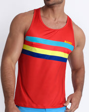 Frontal view of model wearing Stripe'A'Pose ROUX men’s tank top by the Bang! Clothes brand of men's beachwear from Miami.