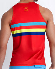 Back view of male model wearing a tank top in red color with color stripes in aqua blue, bold red, yellow and dark blue.