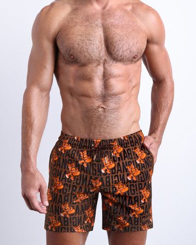 Frontal view of male model wearing the TIGER HEARTS men's premium quality swimwear bottoms by the Bang! Clothes brand of men's swimwear from Miami.