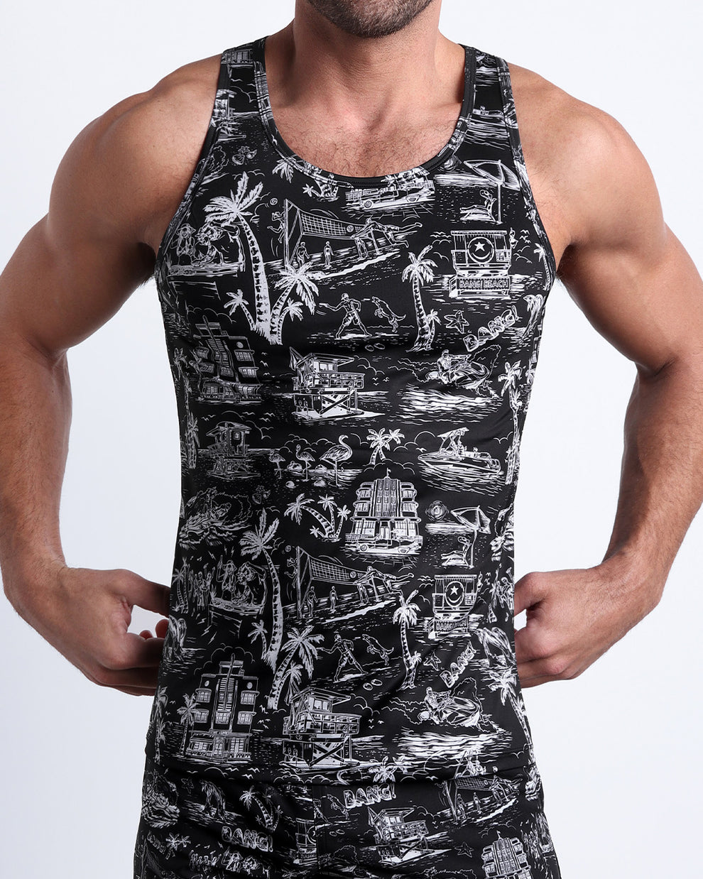 Model wearing the TOILE DE MIAMI (BLACK) matching beach shorts and tank top for a complete look by BANG! Clothes from Miami.