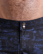 Close-up view of men’s summer beach shorts by BANG! clothing brand, showing custom branded golden buttons.