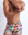 This swimsuit for men features fun and energetic comics-style graphics in bold colors with a prominent BANG! Illustration.